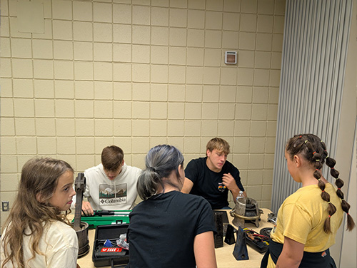 Sixth graders talking to older students at CTC