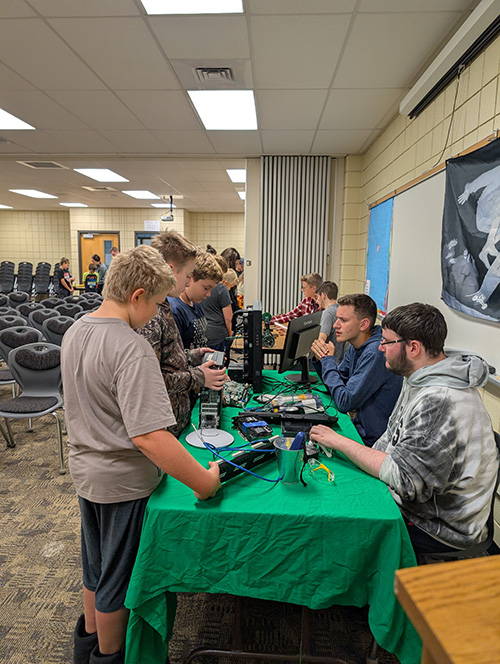 Students talking to older students about CTC programs