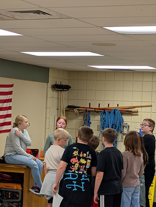 Students learning about a program
