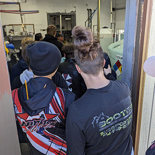 Students inside small room