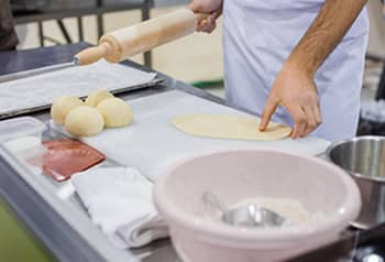Culinary arts student making pastry