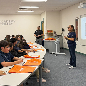 Financial Advisors hosting an educational seminar for students
