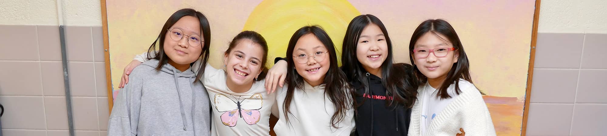 Student stacking blocks