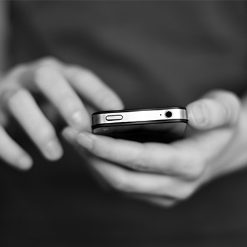 person looking at a cell phone