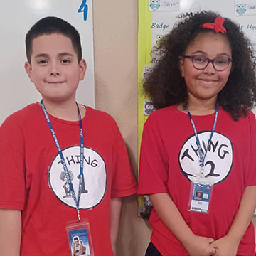Students wearing shirts that say Thing 1 and Thing 2