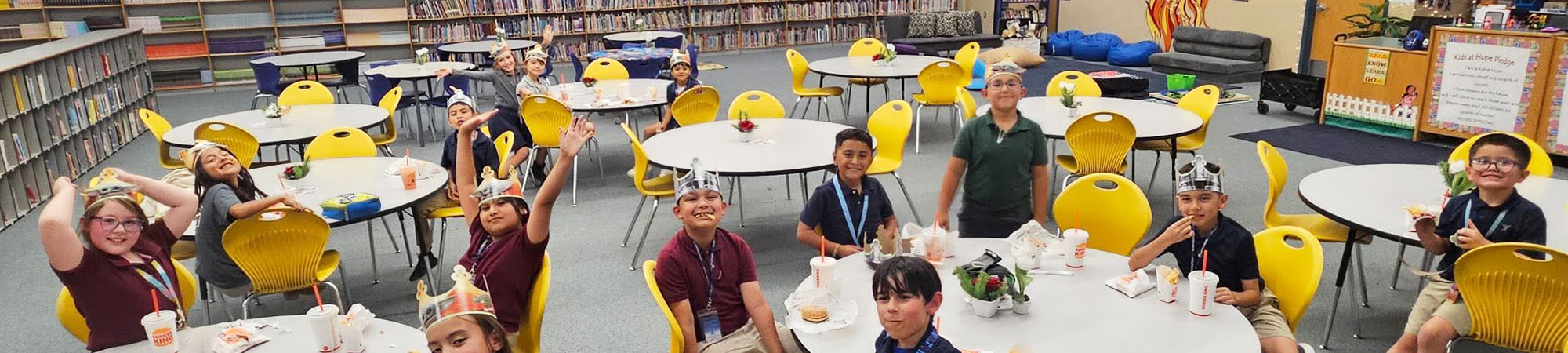 Students enjoying lunch in the library