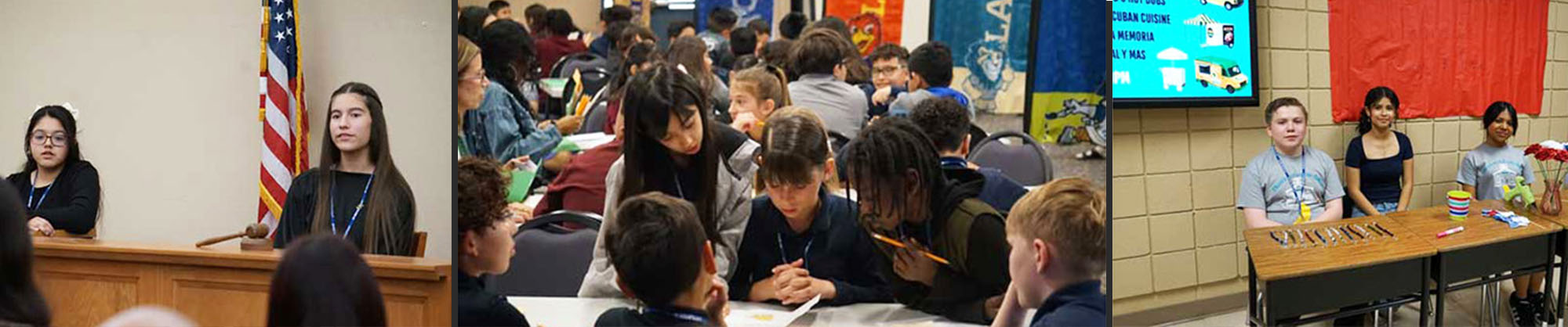 Mock courtroom, students working at tables, and three students behind a craft display