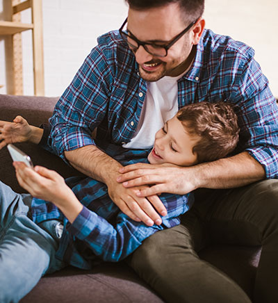 Father hugging his son