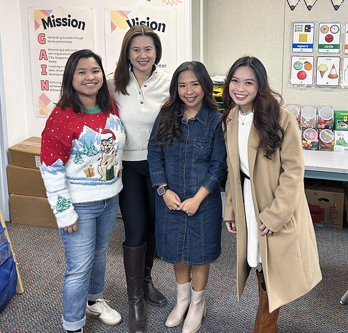 Angela Intia, Rona Cotay, Jeanlee Bagares, and Anne Abella posing for a picture