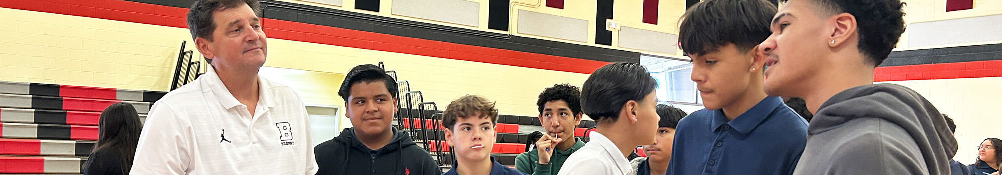 Group of student attending an information fair in the gym