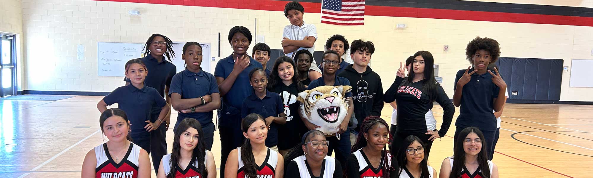 Students lines up in the gym