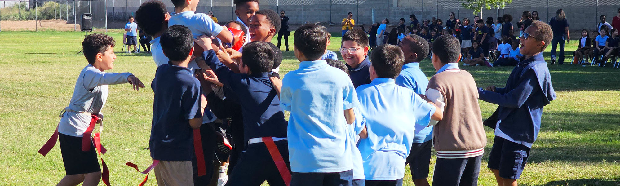 Group of students playing a game on the field