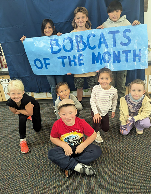 Group of happy students representing Bobcats of the Month for September 2025