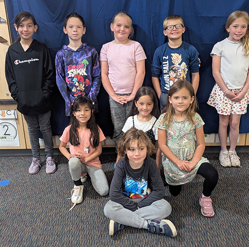 Group of happy students representing Frazier's Finest for May 1, 2026