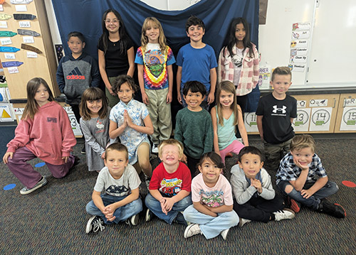 Group of happy students representing Principal Compliment Celebration for September 2025