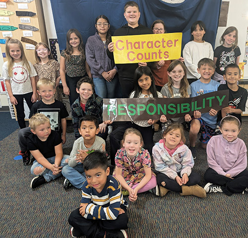 Group of happy students representing Student of the Month for September 2025