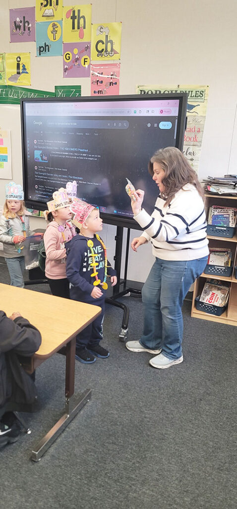 Teacher talking with her TK and kindergarten students