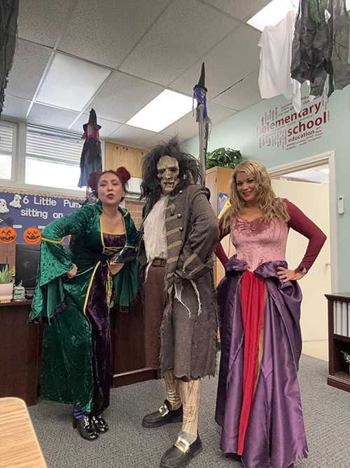 Staff members dressed up for Halloween