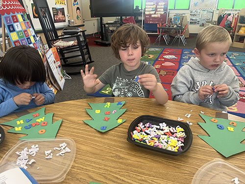 TK students making Chicka Chicka alphabet trees