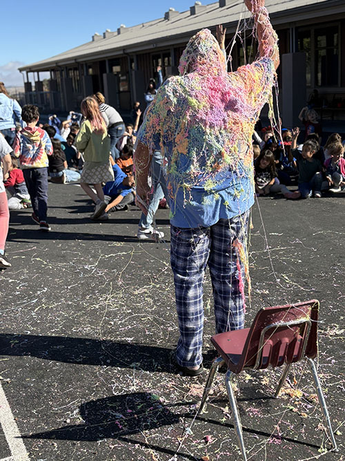 Principal drenched in Silly String for achieving 100% attendance for October