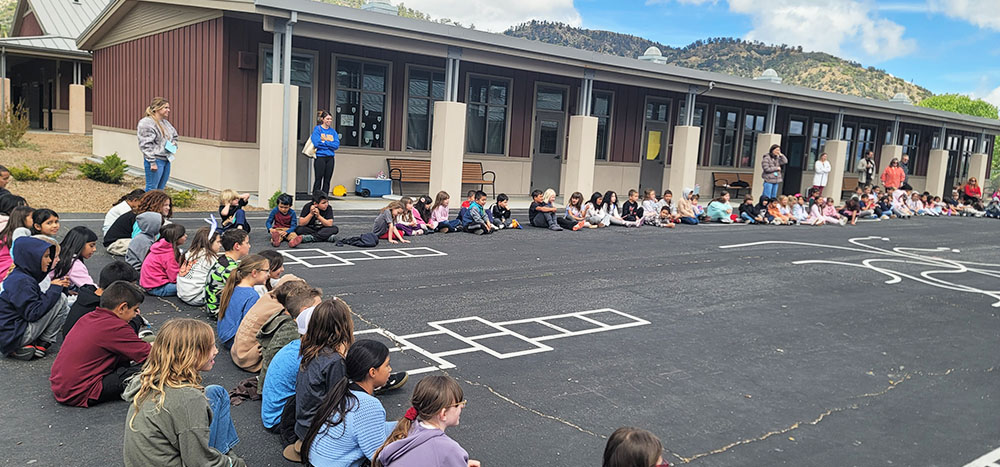Students on the blacktop enjoying a pep rally to kick off Diagnostic III
