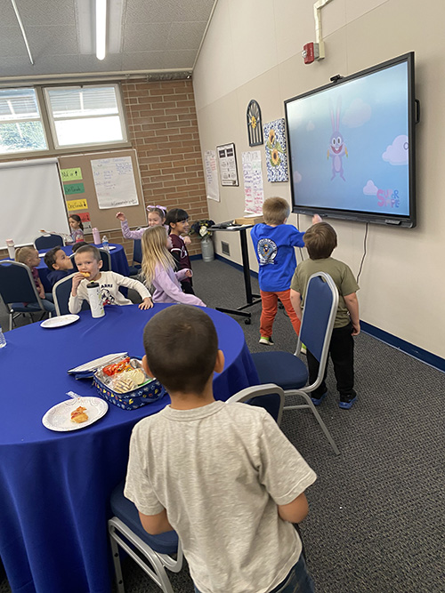 Students enjoying perfect attendance award