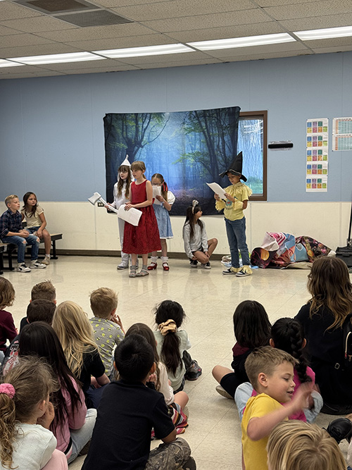 Student enjoying The Wizard of Oz performance