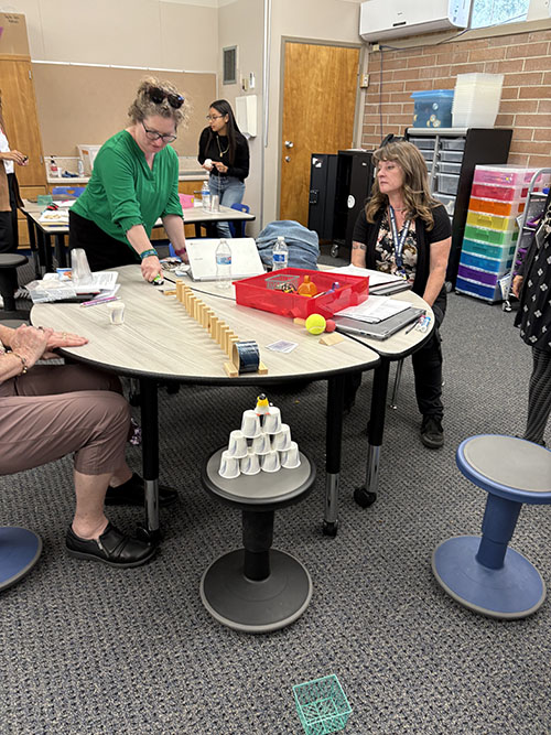 Teachers participating in a STEAM training event