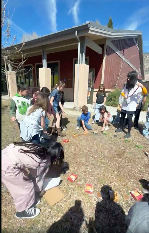 Students outside learning about math