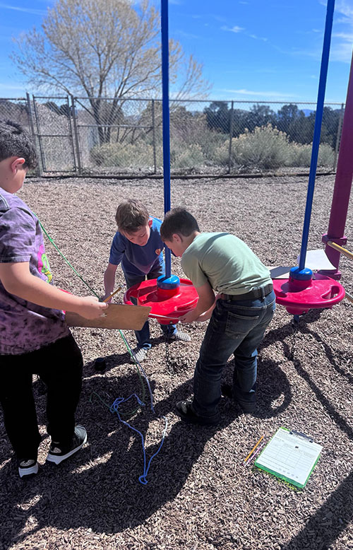 Third graders in Mrs. Page’s class outside working on a Pi project