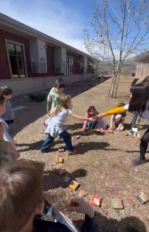 Students outside learning about Pi