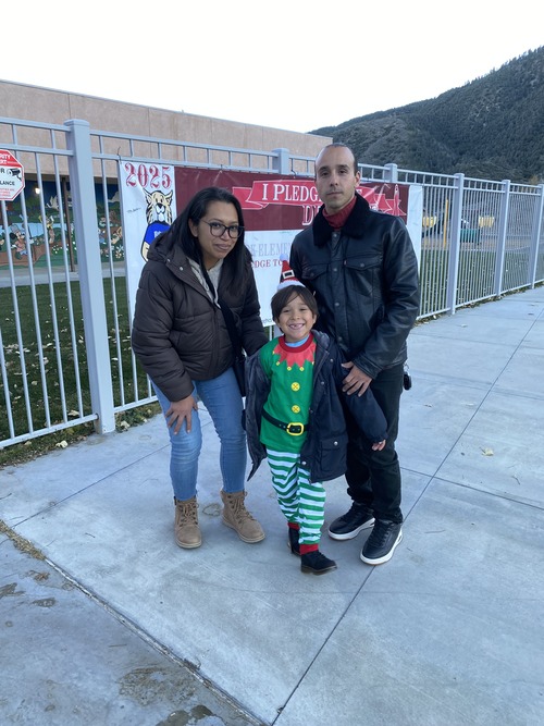 Parents with a student elf