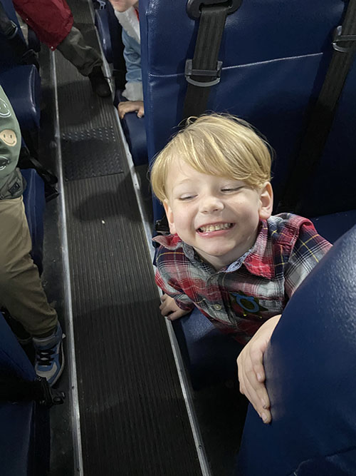 Boy smiling on the bus