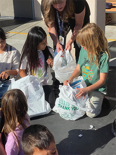 students opening bags