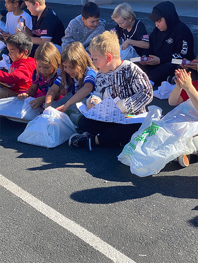 students opening bags