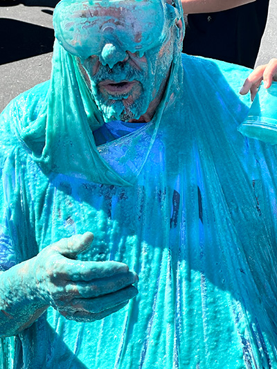 Close-up of Principal McNelis covered in blue slime