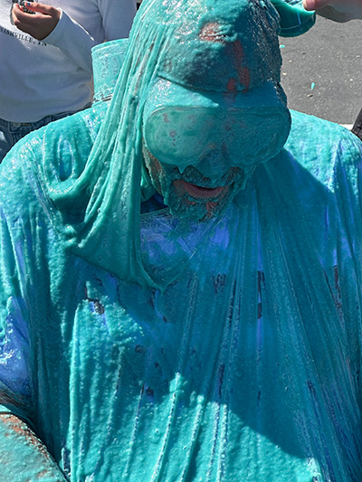 Another close-up of Principal McNelis covered in blue slime