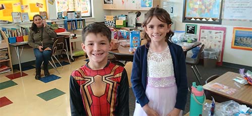 Student in princess and spiderman costume