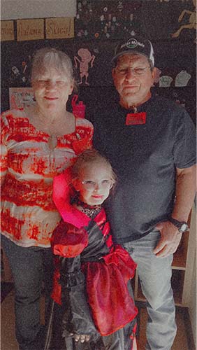 Grandparents with student