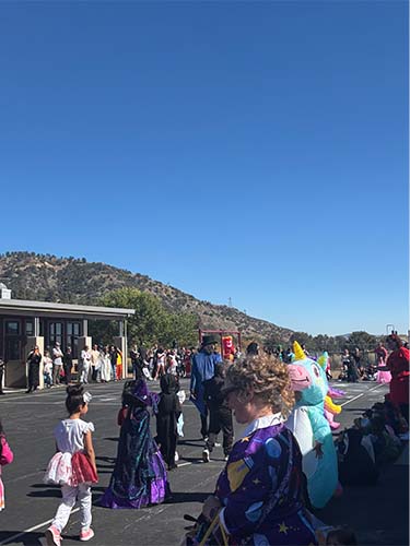 Students walking in costume parade