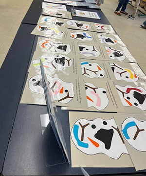 papers with different colored shapes on them