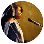 High school graduate speaking into microphone