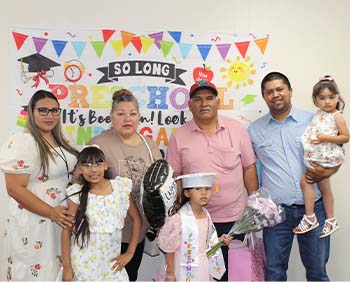 Student and family at graduation