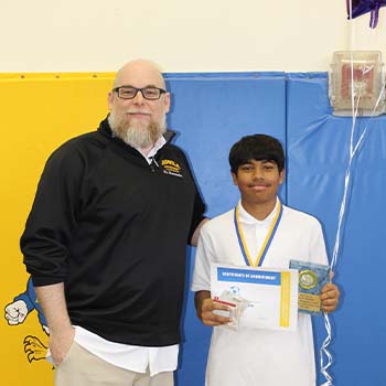 student with superintendent