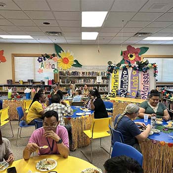 Teachers in a library