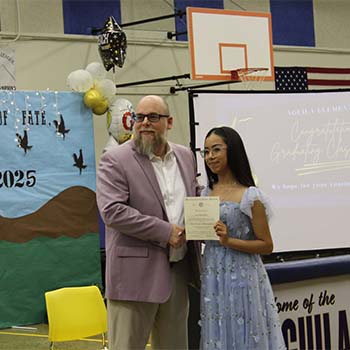 Student receiving an award