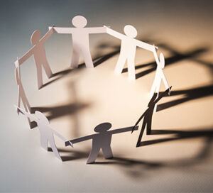People-shaped paper model representing teamwork