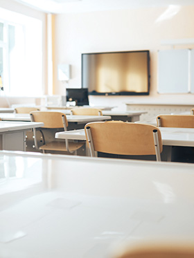 Empty desks in a school classroom